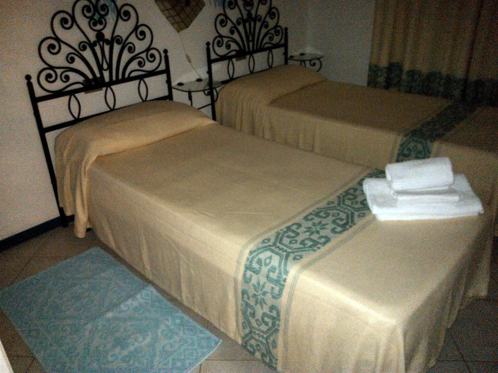 Hotel Residence Rena Bianca Baja Cerdeña Habitación foto